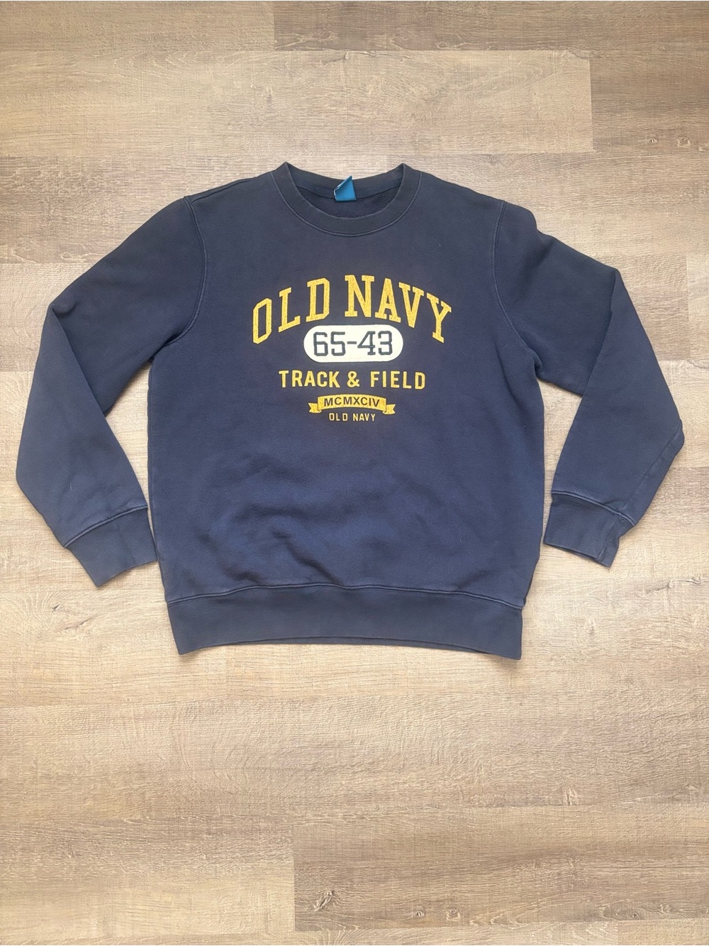 90’s Vintage Old Navy Navy Crewneck Sweatshirt with Yellow Track & Field Graphic